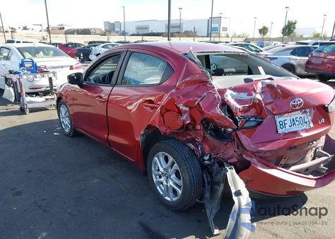 2018 Toyota Yaris Ia из США, поврежденный, VIN 3MYDLBYV1JY317976